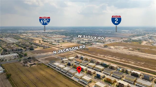 a view of a house with backyard