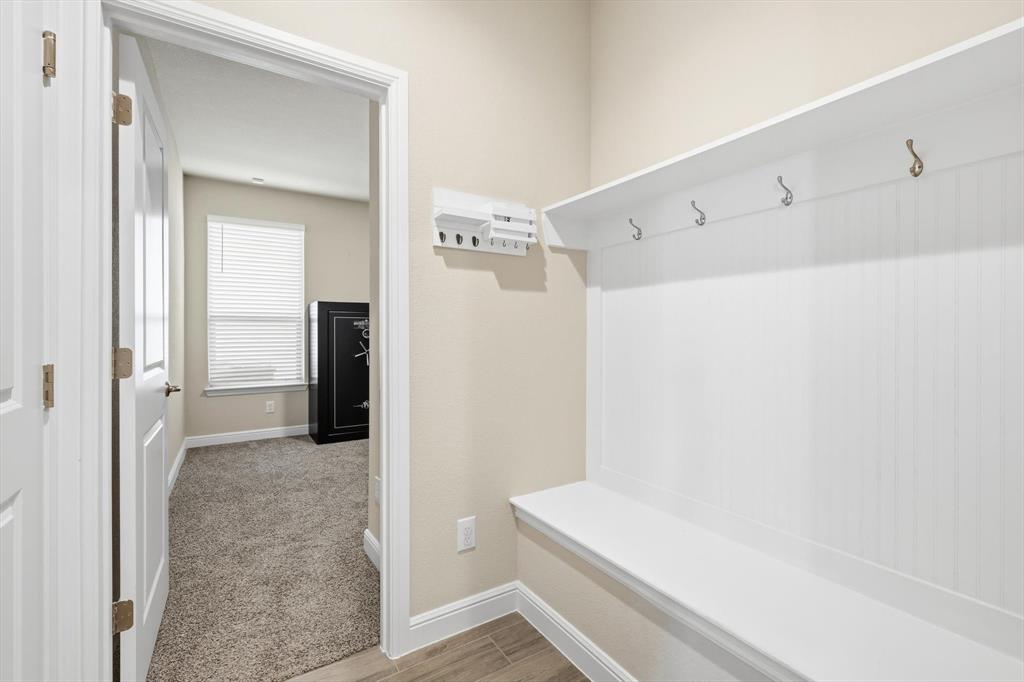 317 Hogan Drive Denton, TX 76210 - Photo 22 of 30 a bathroom with a sink and a shower