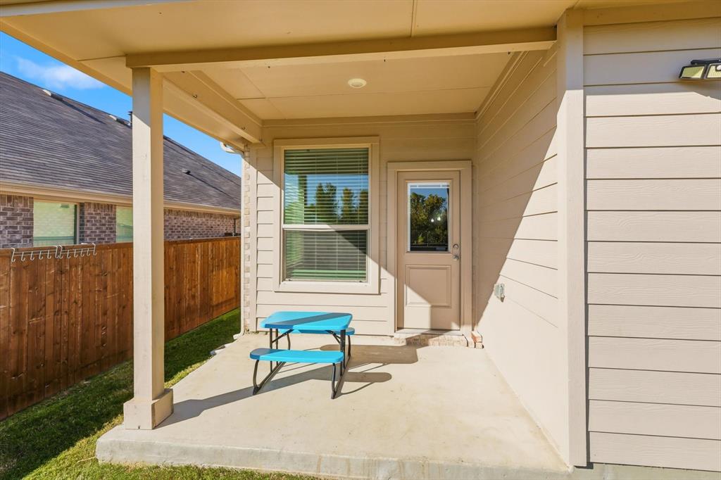 317 Hogan Drive Denton, TX 76210 - Photo 27 of 30 a building outdoor space with patio furniture