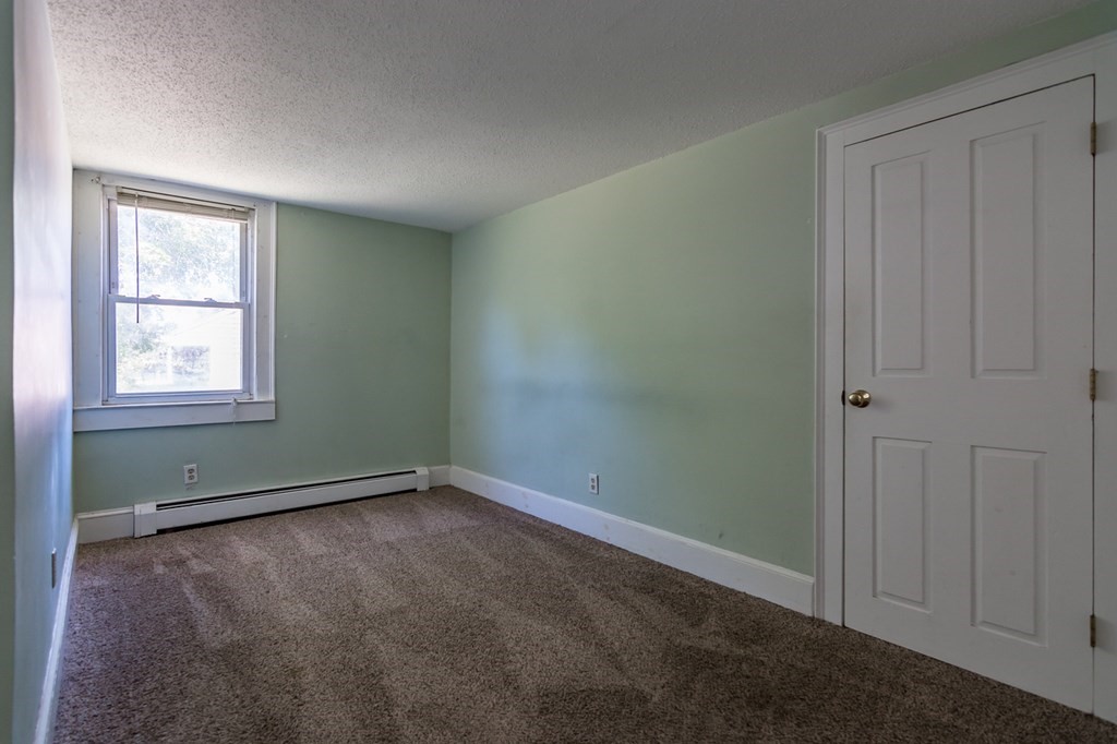 139 Baldwin Street Lowell, MA 01851 - Photo 18 of 39 an empty room with windows