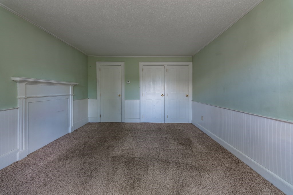 139 Baldwin Street Lowell, MA 01851 - Photo 21 of 39 a view of an empty room and closet in it