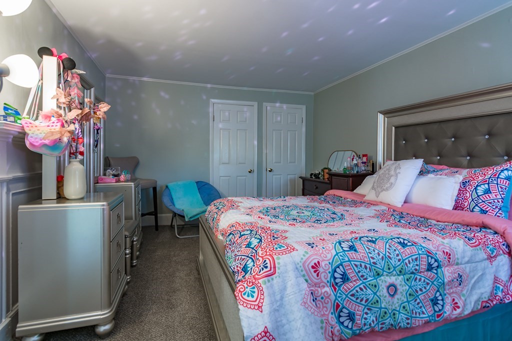 139 Baldwin Street Lowell, MA 01851 - Photo 10 of 39 a bedroom with bed and a window