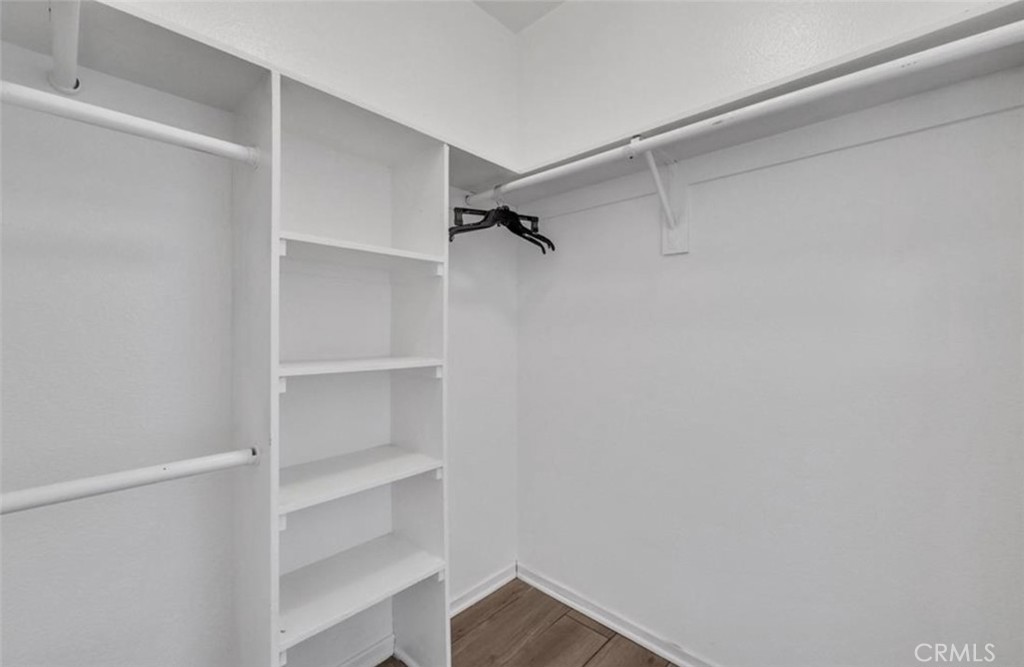 3738 Harrison Street, Unit 31 Riverside, CA 92503 - Photo 16 of 25 a view of walk in closet with empty racks