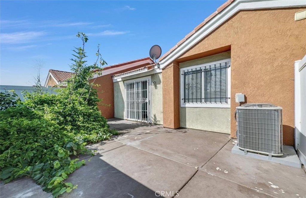 3738 Harrison Street, Unit 31 Riverside, CA 92503 - Photo 21 of 25 a front view of a house with garden
