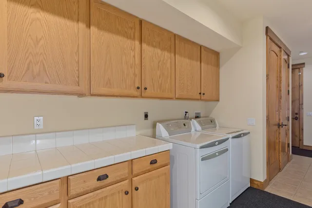 a view of cabinets with wooden floor