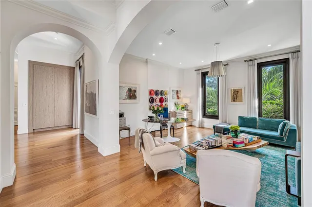 a living room with furniture and a rug