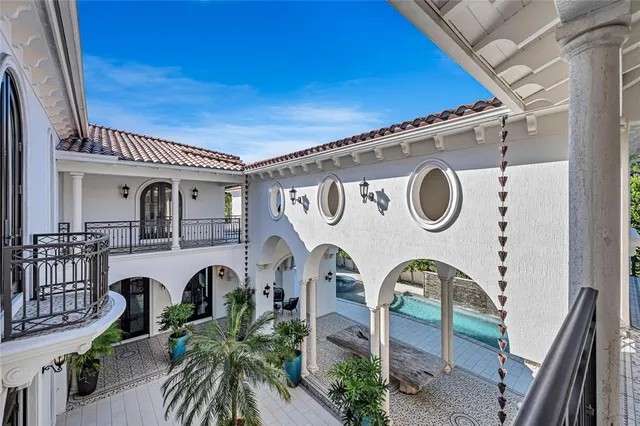 a bedroom with a large bed and a couch