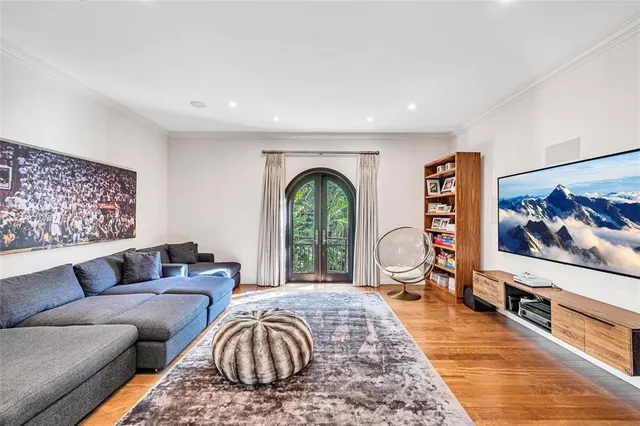 a view of hall way with furniture