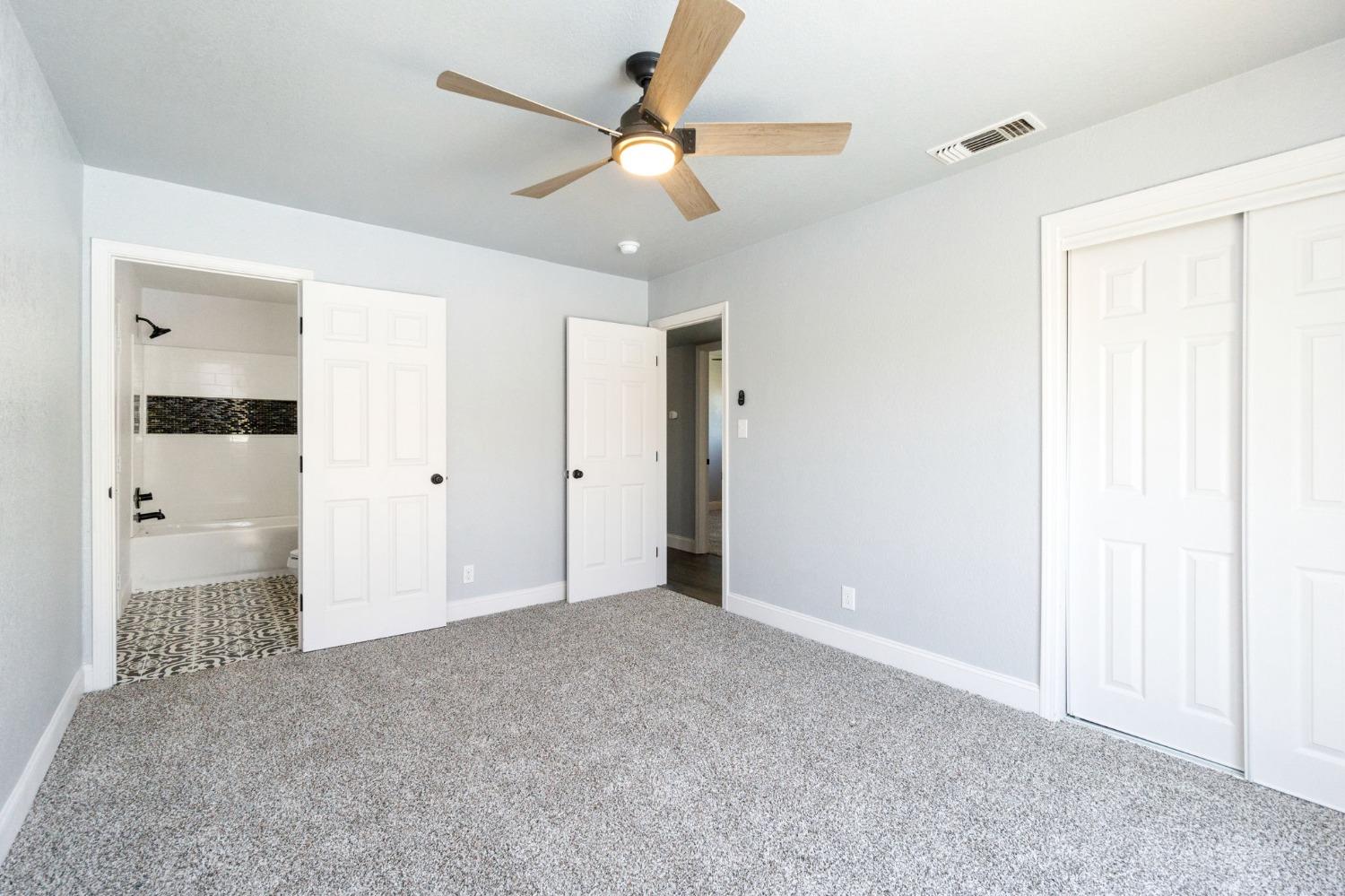 3086 West Hampton Way Fresno, CA 93722 - Photo 25 of 33 a view of an empty room