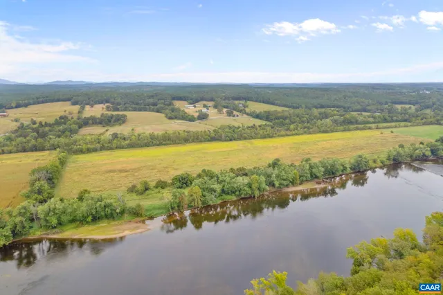 a bed room with a bed and a window
