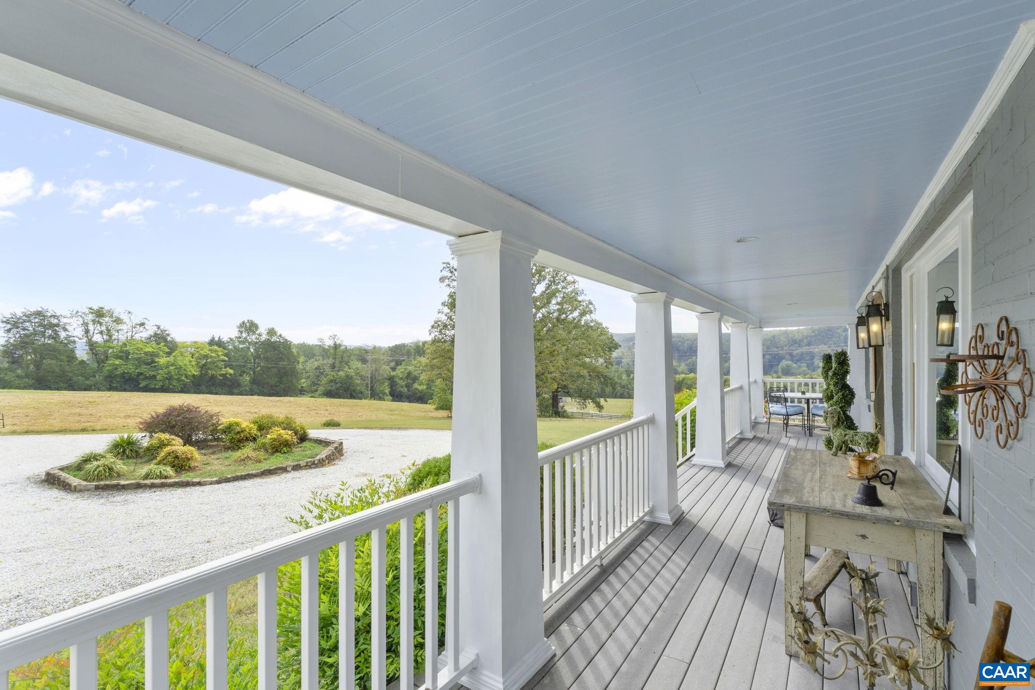 12189 Norwood Road Wingina, VA 24599 - Photo 8 of 75 a view of a porch with furniture and a yard