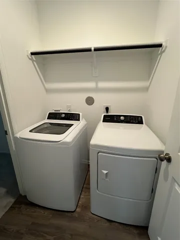 a utility room with washer and dryer
