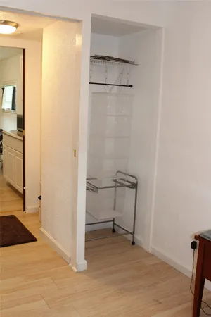 a view of a room with table and chair