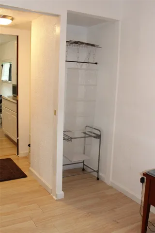 a view of a room with table and chair