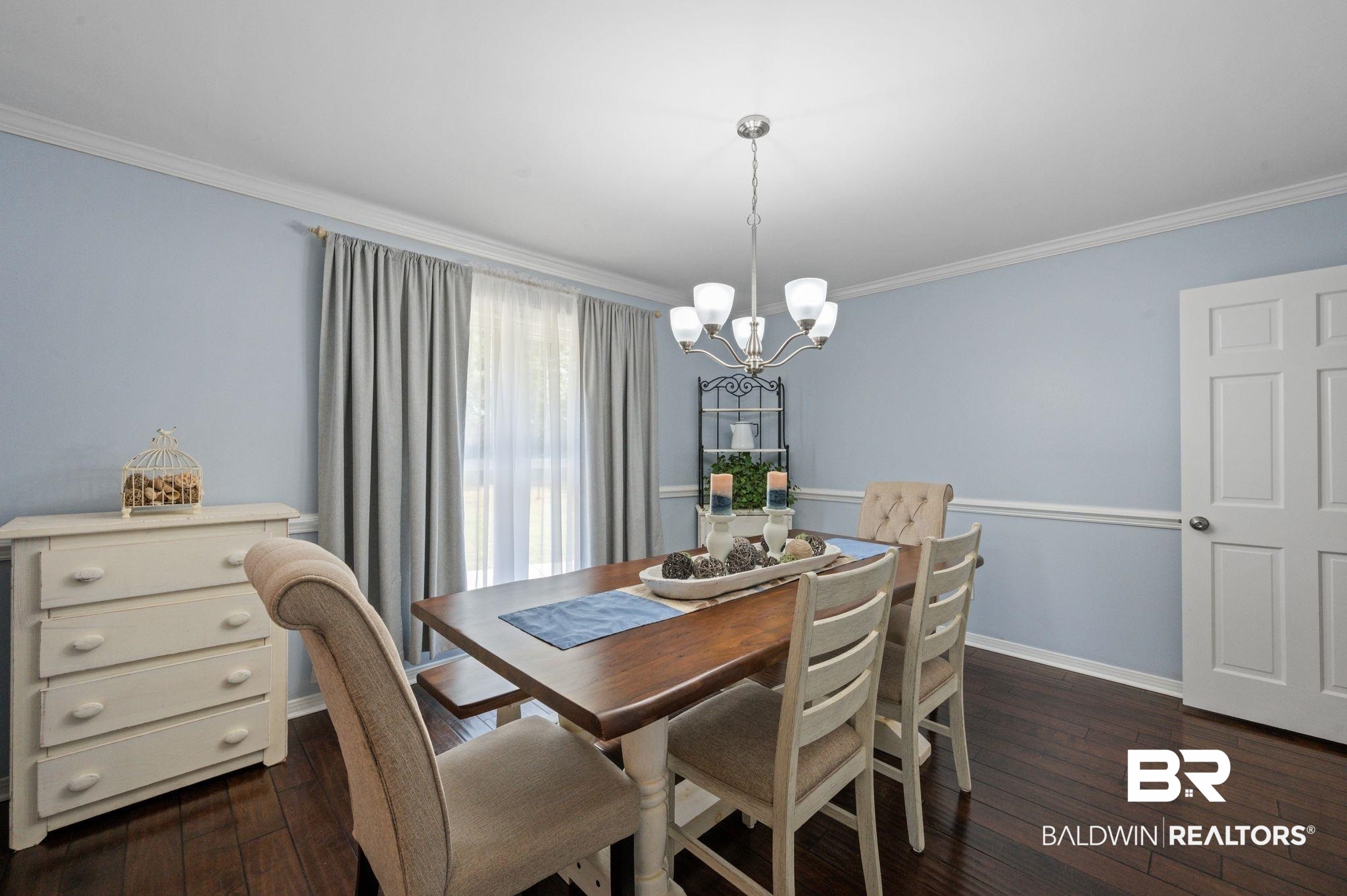 20037 County Road 33 Fairhope, AL 36532 - Photo 19 of 79 Dining space featuring crown molding, a chandelier, and dark hardwood / wood-style floors