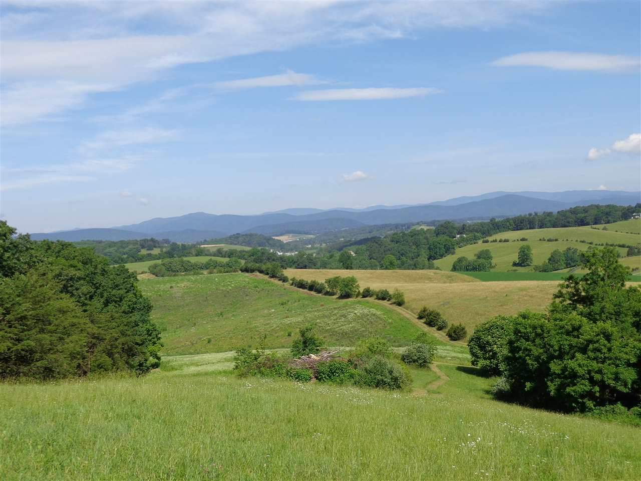 97-acres Curry Road Churchville, VA 24421 - Photo 1 of 11 a view of a lake with a city