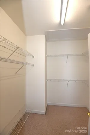 a view of a room with racks on the wall