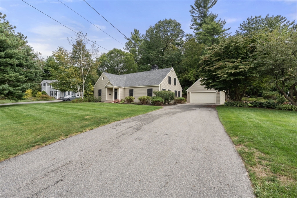 92 Abbot Street Andover, MA 01810 - Photo 4 of 35 a front view of a house with a yard