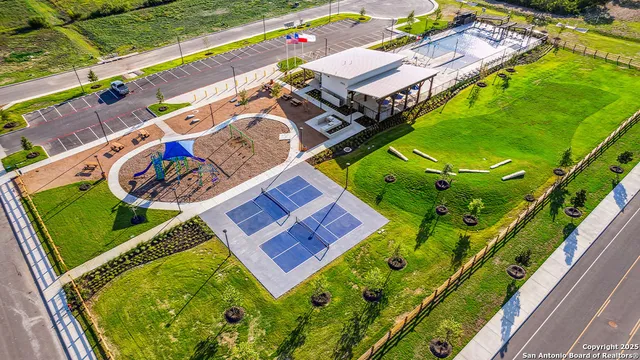 a view of swimming pool with a sitting area