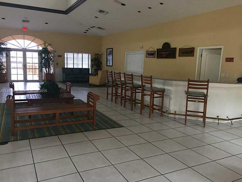 13674 Southwest 124th Avenue Road Miami, FL 33186 - Photo 18 of 21 a living room with a large window