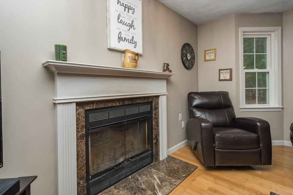 41 Tannery Road Sturbridge, MA 01518 - Photo 16 of 42 a living room with furniture and a fireplace