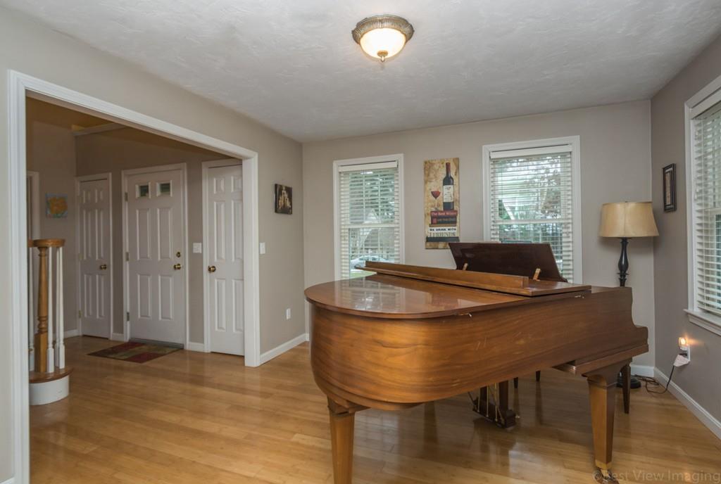 41 Tannery Road Sturbridge, MA 01518 - Photo 21 of 42 a living room with furniture and a table