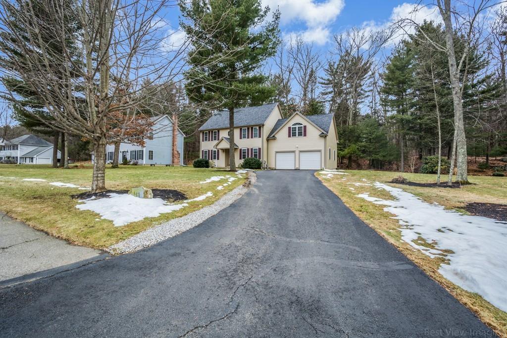 41 Tannery Road Sturbridge, MA 01518 - Photo 3 of 42 a view of a white house with a yard and large tree