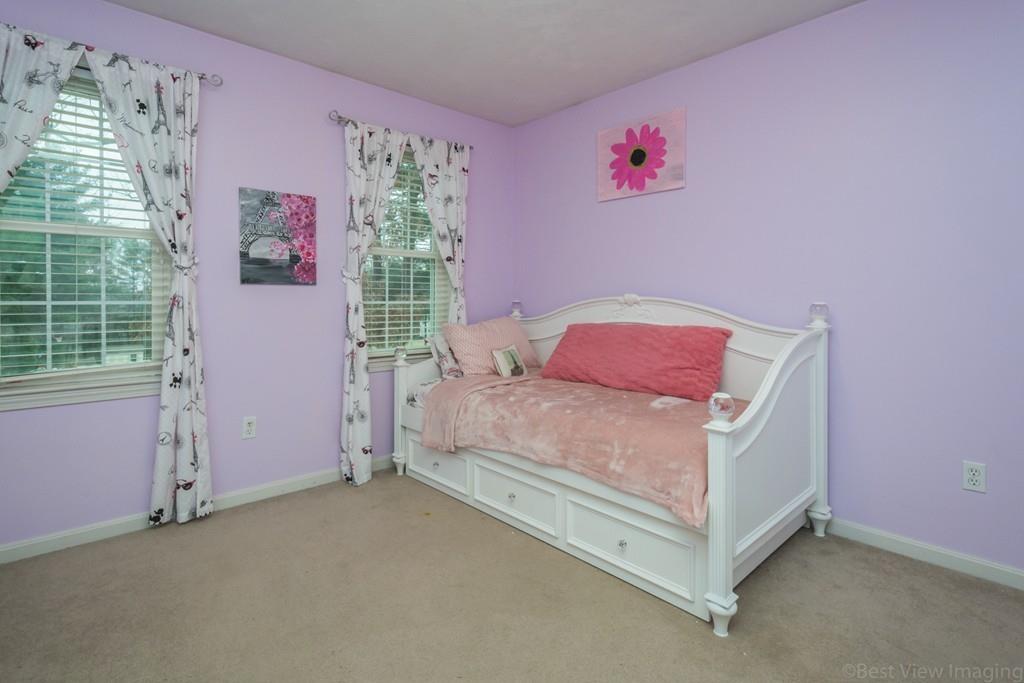 41 Tannery Road Sturbridge, MA 01518 - Photo 33 of 42 a bedroom with a bed and a window