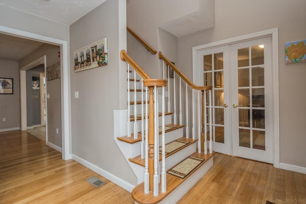 41 Tannery Road Sturbridge, MA 01518 - Photo 4 of 42 a view of entryway with wooden floor and stairs