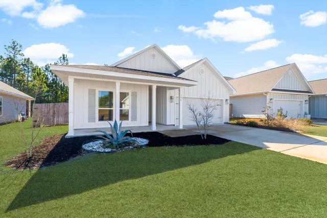 a house view with a garden space