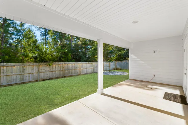 a view of backyard with green space