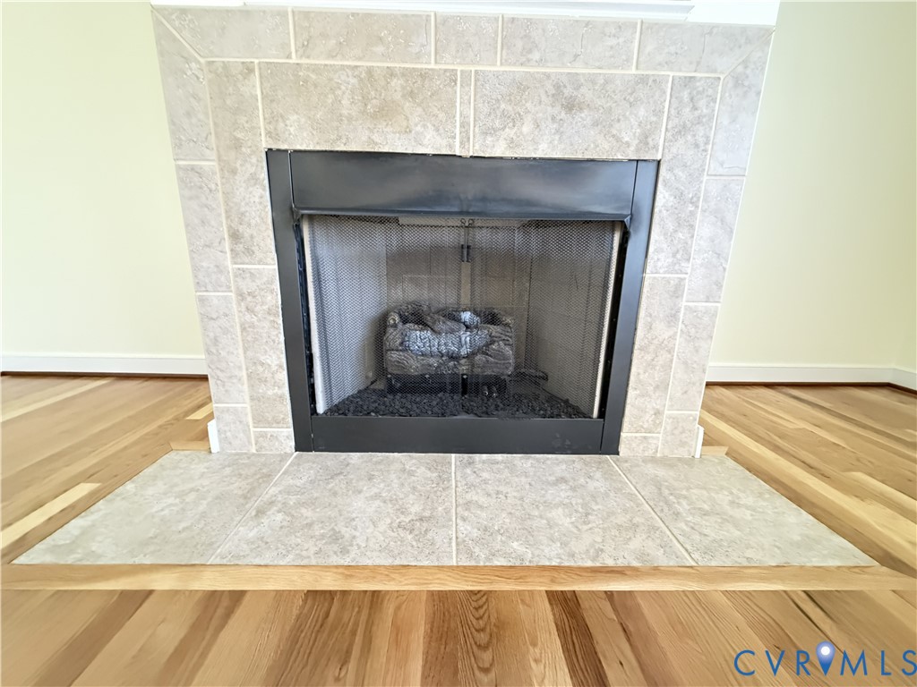 10911 Weybridge Road Chester, VA 23831 - Photo 13 of 38 a room with a fireplace