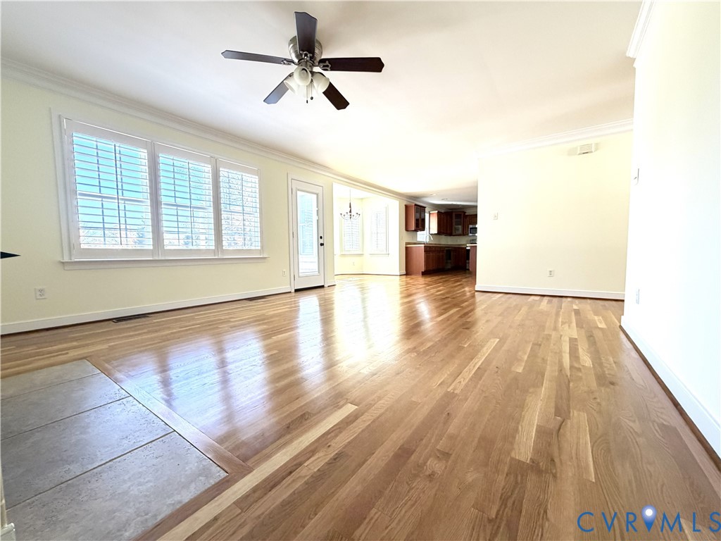 10911 Weybridge Road Chester, VA 23831 - Photo 14 of 38 a view of a livingroom with wooden floor