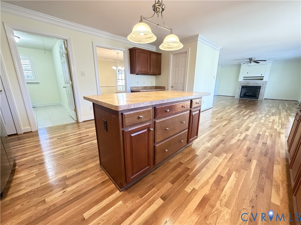 10911 Weybridge Road Chester, VA 23831 - Photo 20 of 38 a room with wooden cabinets and hallway