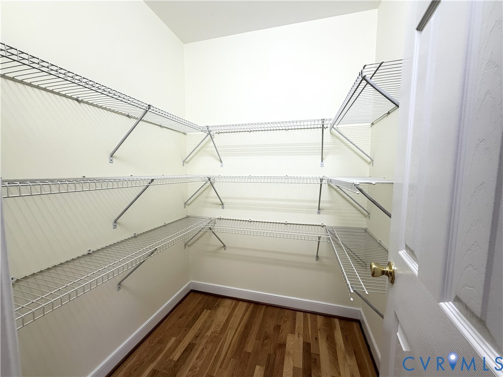 10911 Weybridge Road Chester, VA 23831 - Photo 23 of 38 a view of a room with racks on the wall