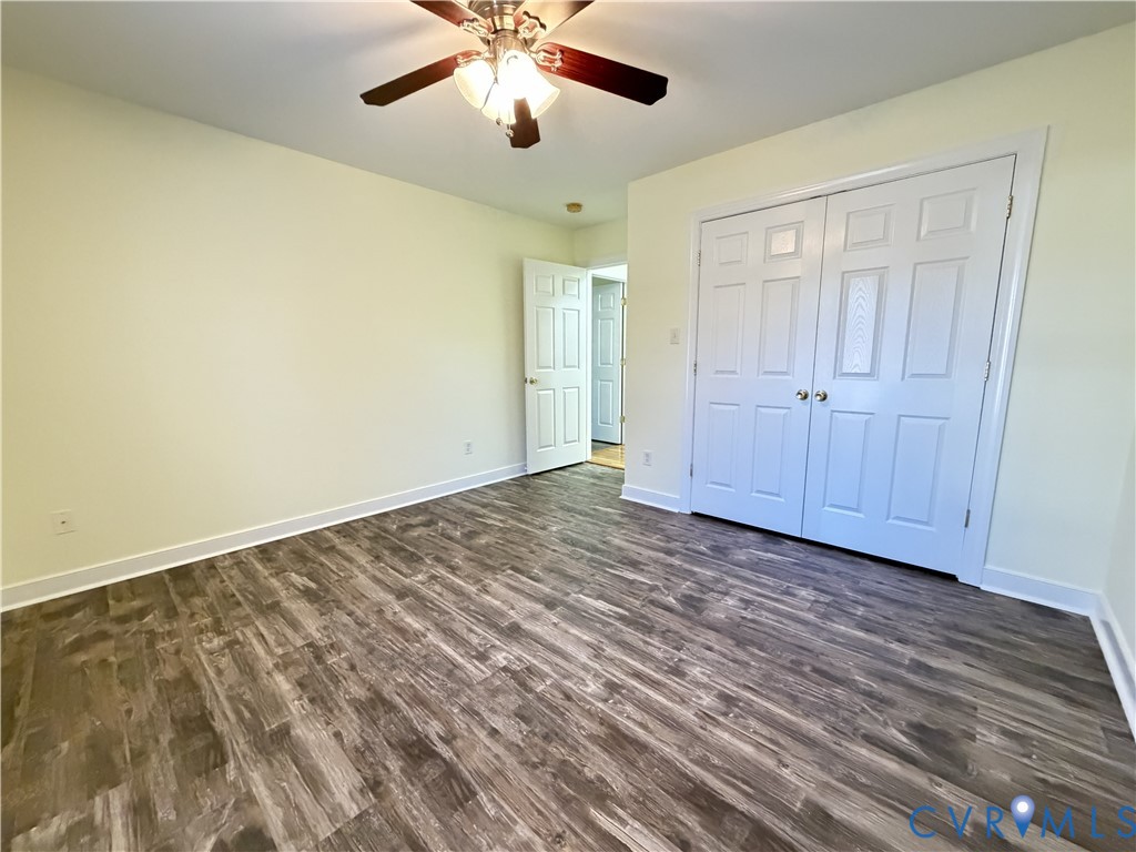 10911 Weybridge Road Chester, VA 23831 - Photo 36 of 38 wooden floor in an empty room