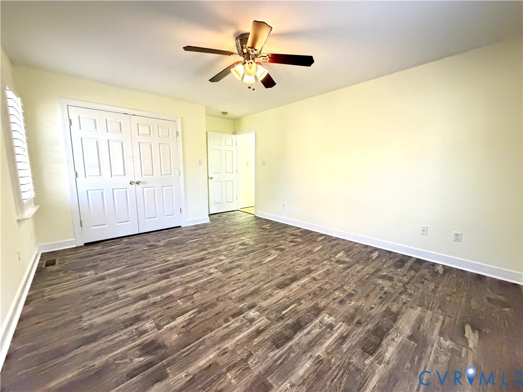 10911 Weybridge Road Chester, VA 23831 - Photo 38 of 38 wooden floor in an empty room