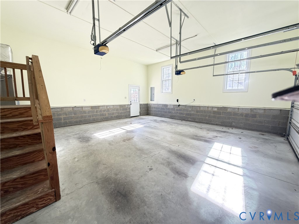 10911 Weybridge Road Chester, VA 23831 - Photo 5 of 38 a view of a room with stairs and a window