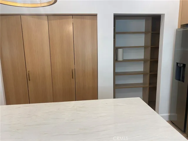 a bedroom with a wooden bed