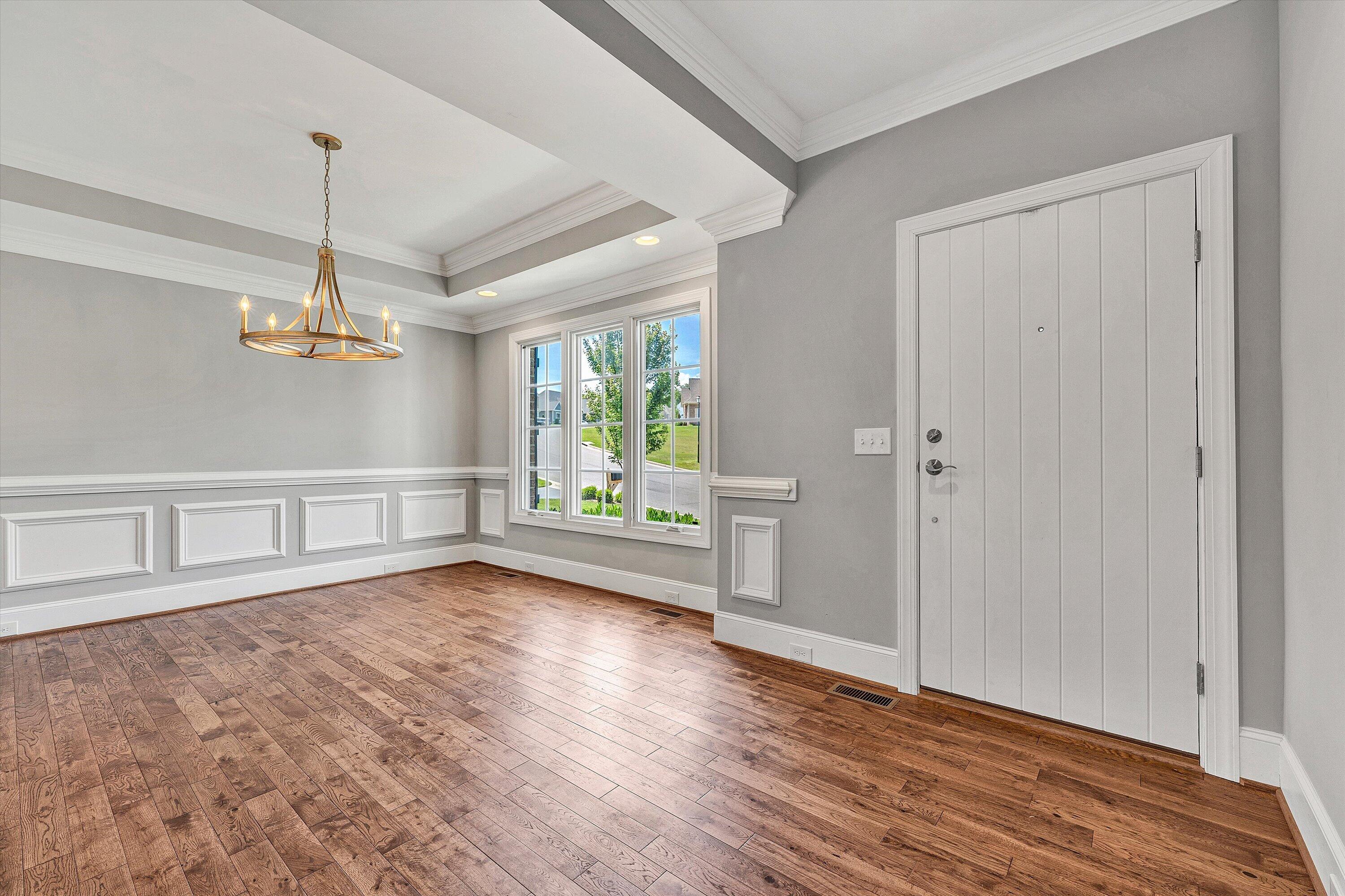 6981 Fairway Ridge Road Salem, VA 24153 - Photo 9 of 53 a view of a room with wooden floor window and a ceiling fan