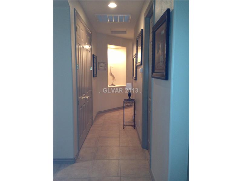 164 Maggie Mei Road Las Vegas, NV 89183 - Photo 15 of 16 Other. Hallway leading to three guest bedrooms