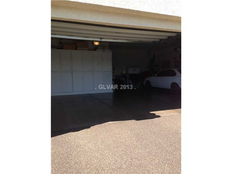 164 Maggie Mei Road Las Vegas, NV 89183 - Photo 16 of 16 Storage. 3 car garage finished with storage system