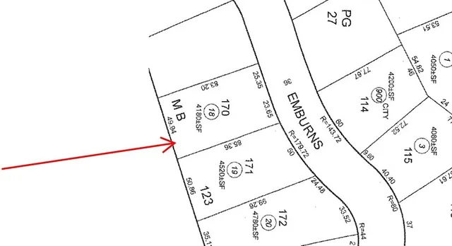 a picture of a field with a sign on it