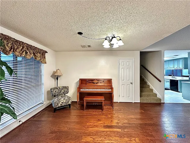 a kitchen with a sink cabinets and appliances