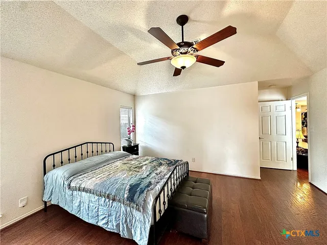 a view of a backyard with swimming pool