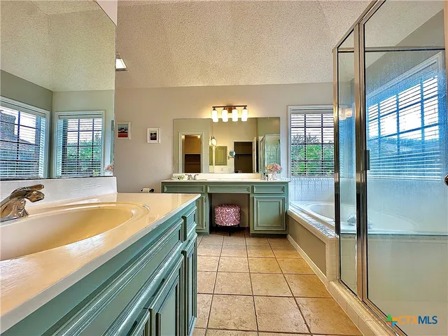 a view of a house with a yard patio and a patio