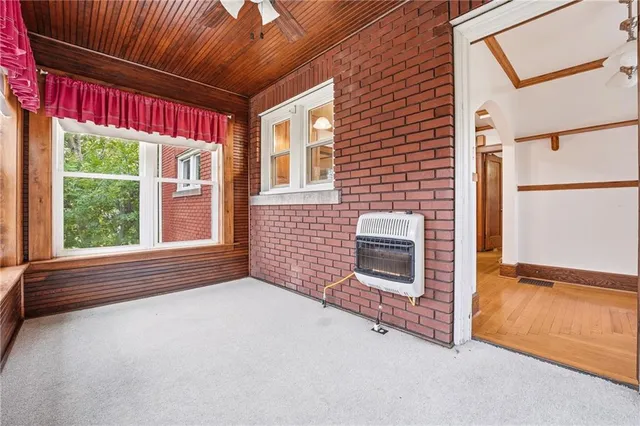 a view of livingroom with furniture and floor to ceiling window