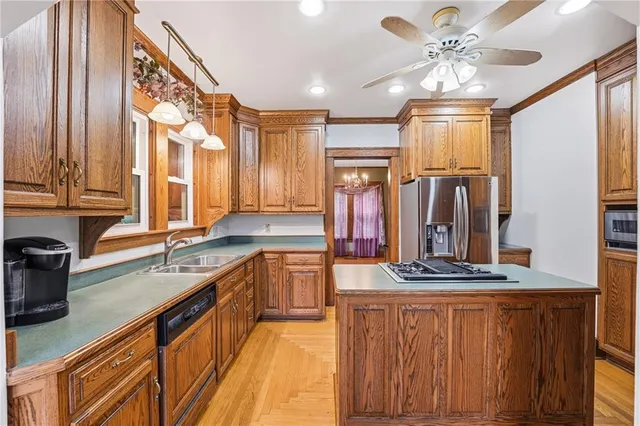 a kitchen with lots of counter top space and cabinets
