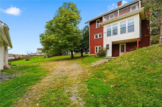 a front view of house with yard