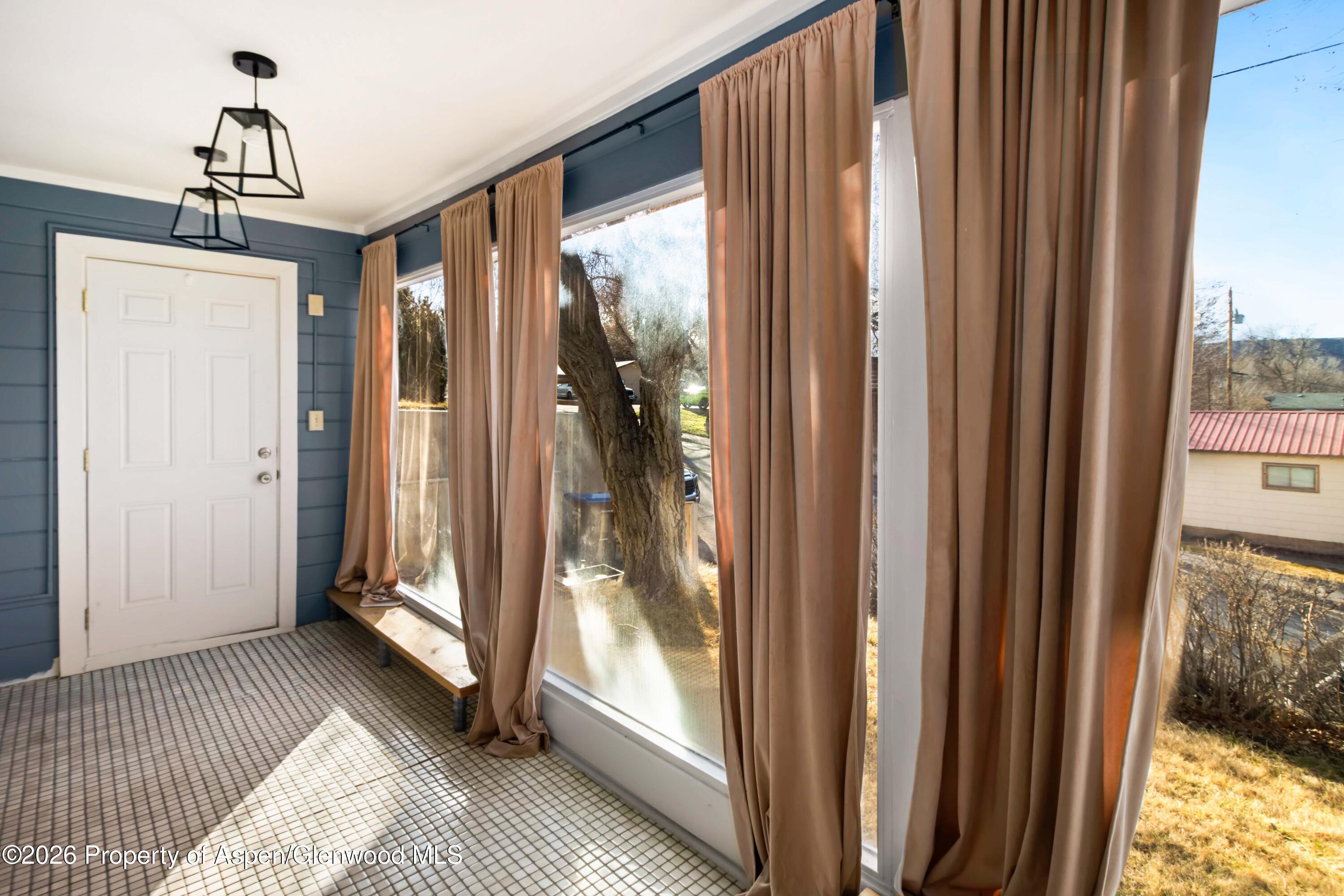 438 East 7th Street Rifle, CO 81650 - Photo 6 of 22 Sunroom/Entry